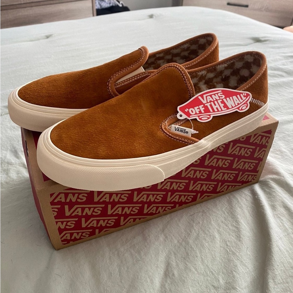 Vans slip on suede pumpkin with checkers inside, ultracush inside. NEVER WORN